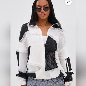 Chic Black and White Ruffled Jacket